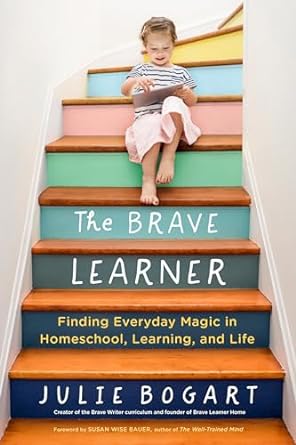 Child on staircase reading a book for homeschooling